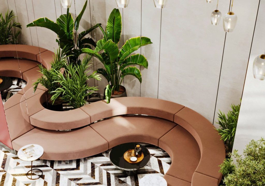 Trendy w hotelarstwie - lobby w kolorach ziemi, z ogrodem zimowym